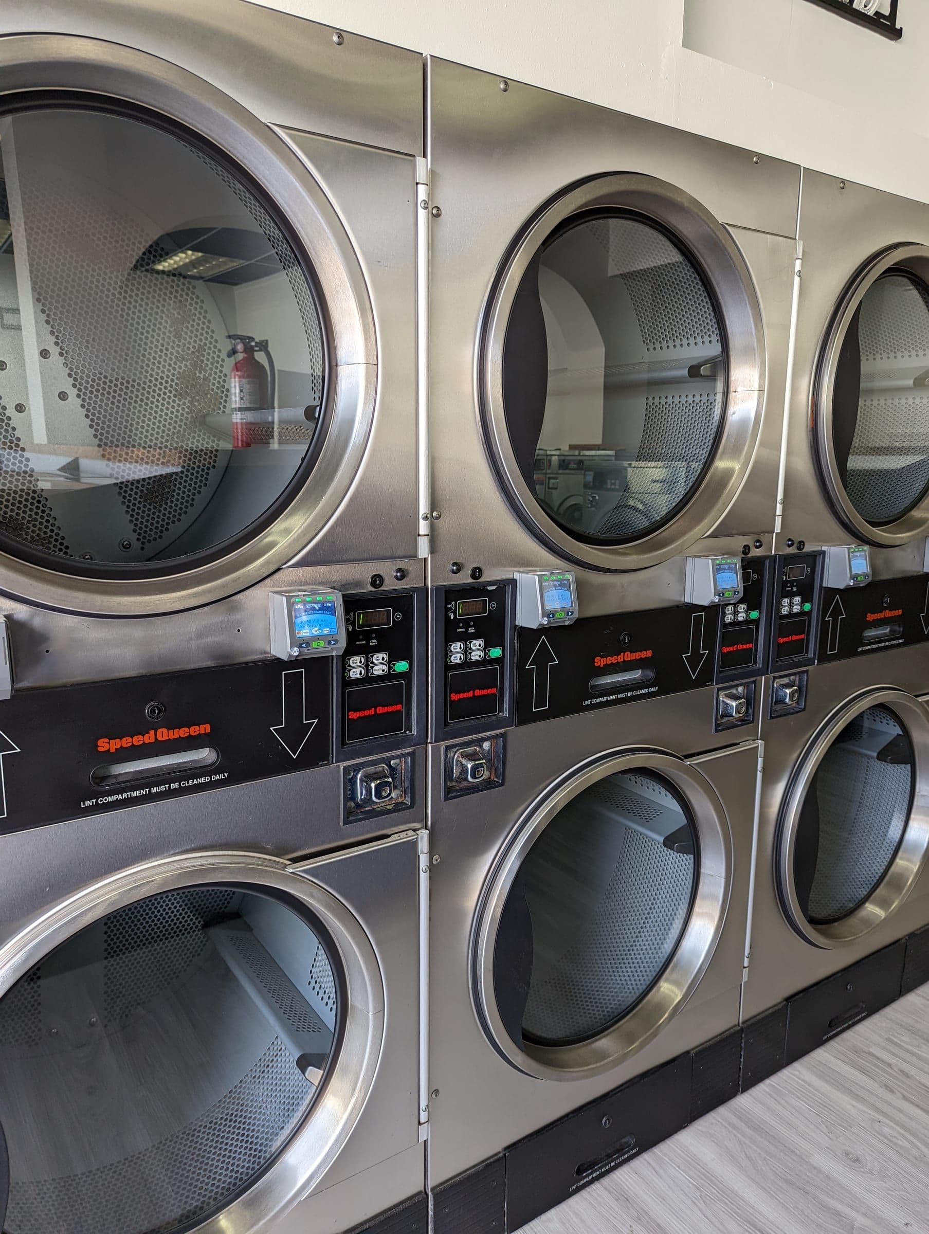 Speed Queen front-load washers at El Porto Laundry's self-service laundromat